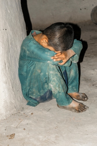 A,Young,An,Asian,Child,With,Sad,Face,Expression,Is