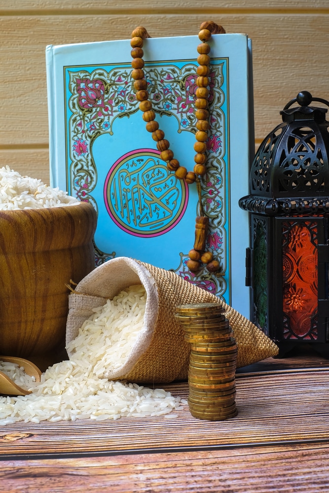 Zakat,Word,,Coin,Stacked,,,Quran,And,Rice.zakat,Concept.,Zakat